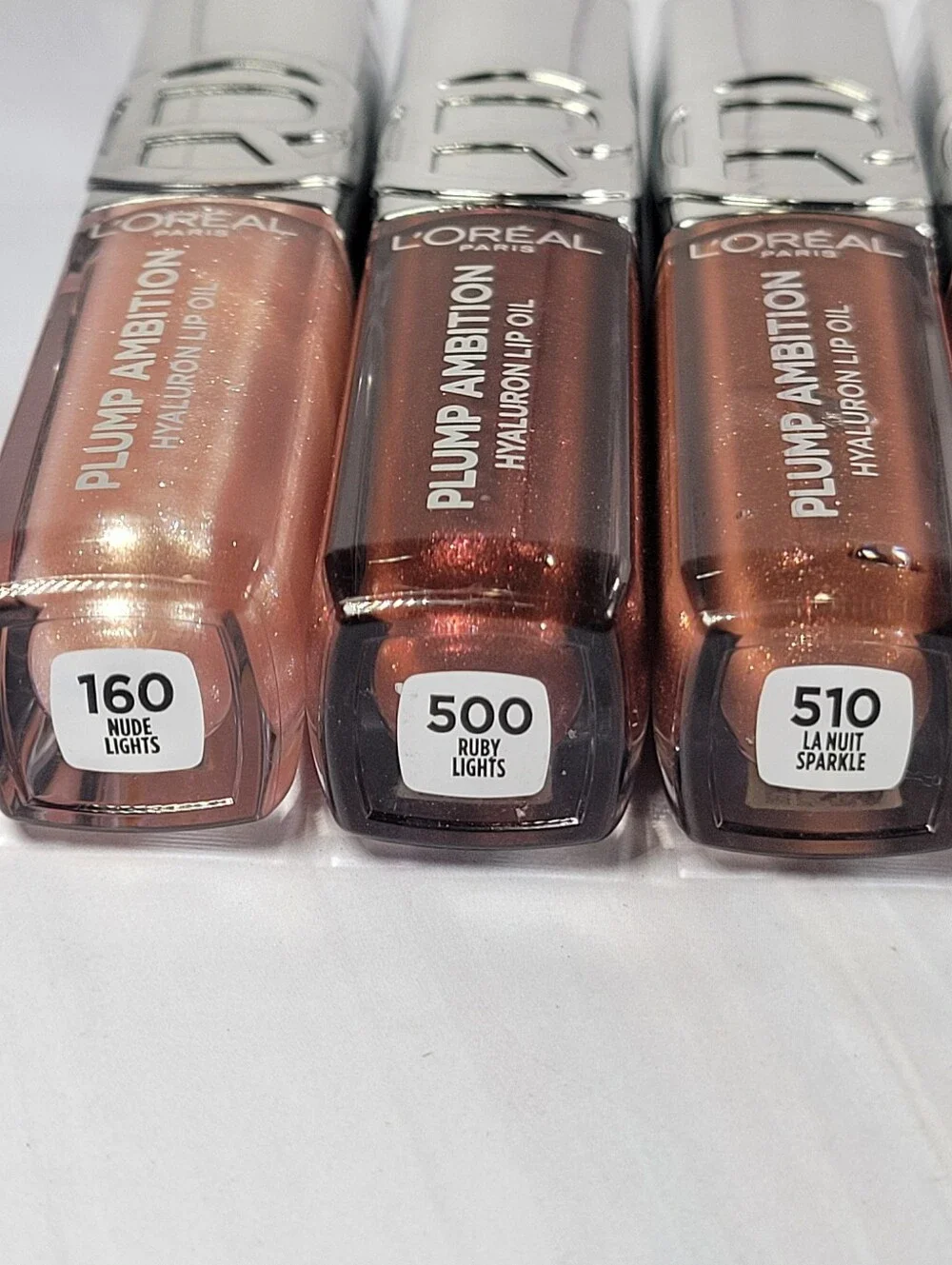 7 Piece L'Oréal Plump Ambition Hyaluron Lip Oil Bundle NEW!